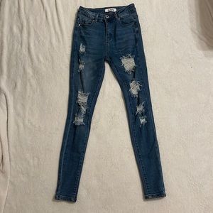 Skinny ripped jeans